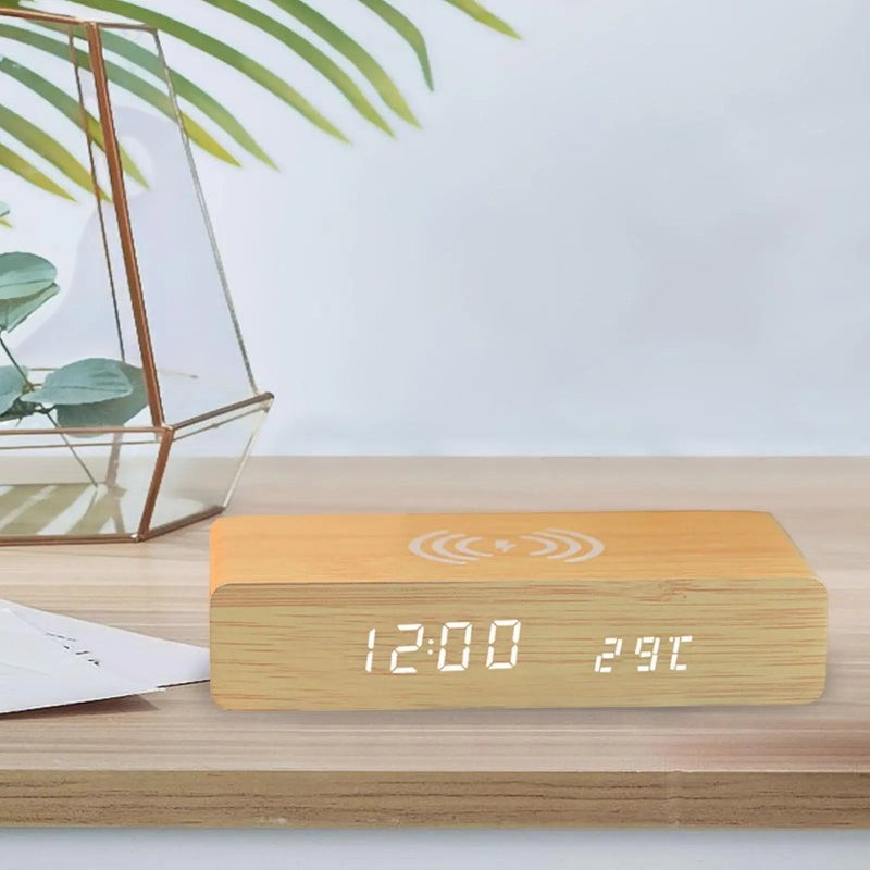 Nova Haus Rise-Charge Smart Clock with wireless charging pad and LED display showing time and temperature.